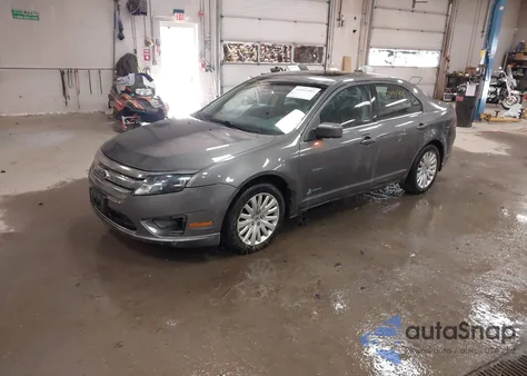 2011 Ford Fusion Hybrid из США, поврежденный, VIN 3FADP0L33BR314785